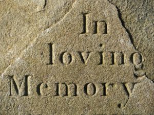 stone carved with ' in loving memory'